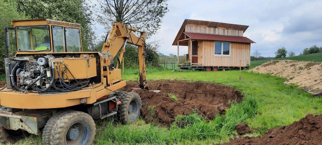 Aushub für Sonnenfang baggern